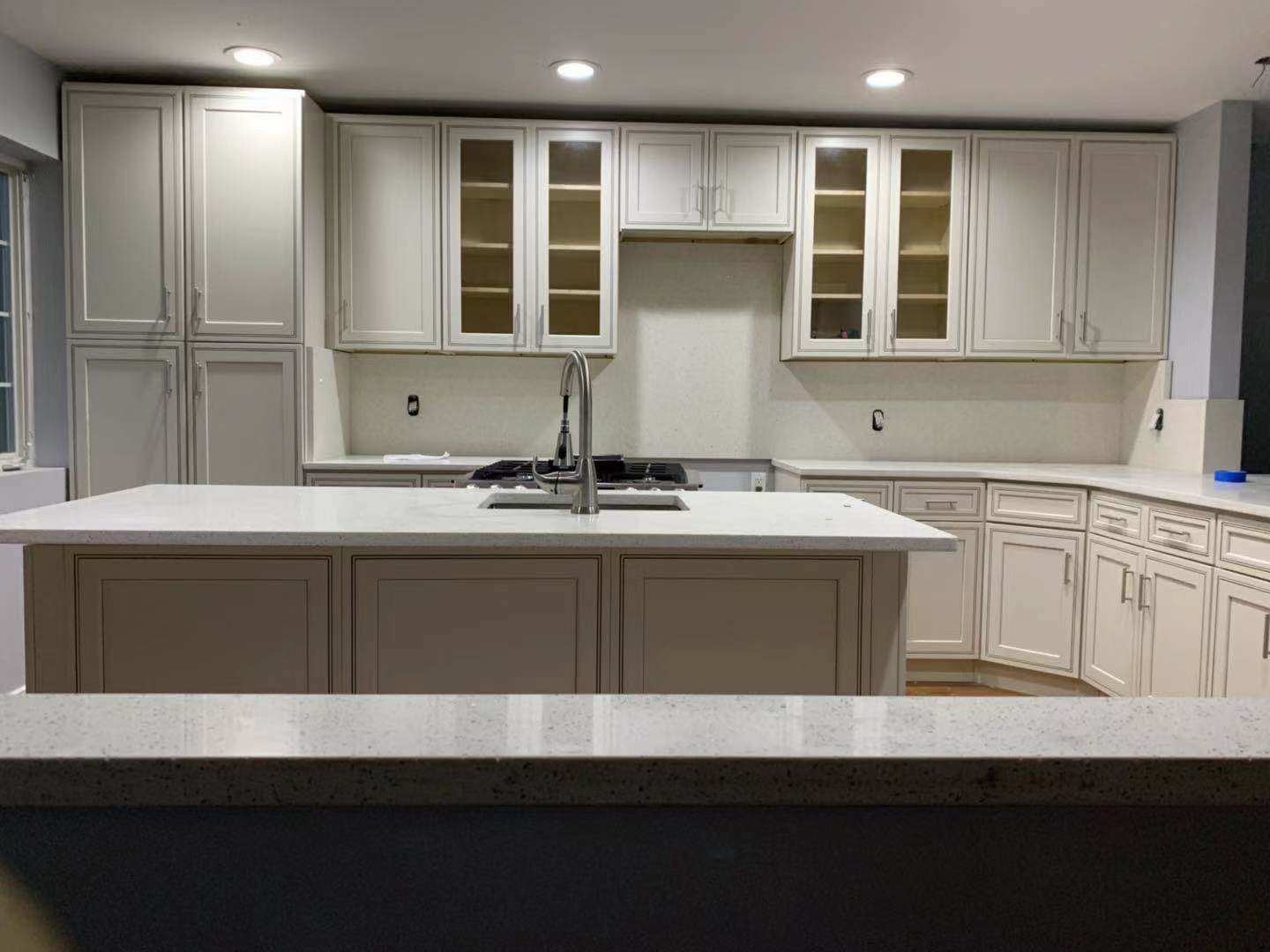 Detailed cabinetry hardware and finish in showroom
