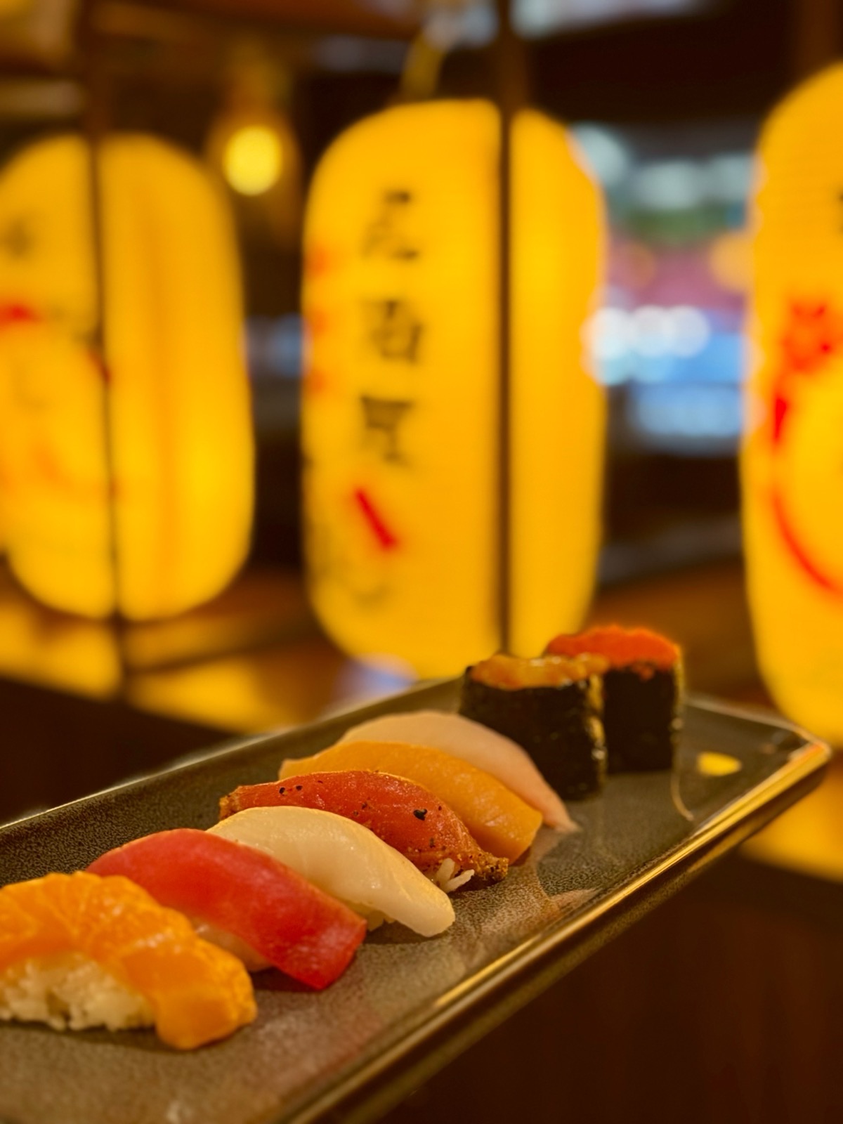 A full AYCE spread with rolls, nigiri and appetizers at KIMOTO